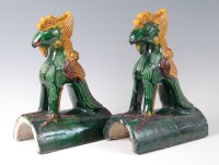Lot 1290 - A pair of Chinese majolica glazed stoneware...