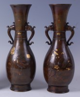 Lot 1305 - A pair of Japanese Meiji period inlaid bronze...
