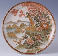 Lot 1308 - A Japanese satsuma charger, decorated with...