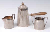 Lot 1313 - A circa 1900 Persian white metal three-piece...
