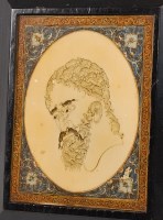 Lot 1314 - A Middle Eastern penwork portrait of a bearded...