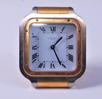Lot 1417 - A Cartier steel and gilt brass cased travel...