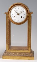 Lot 1427 - A mid-19th century French gilt bronze four...