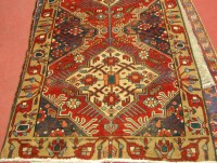 Lot 1454 - A Persian Meshkin woollen runner, the red...