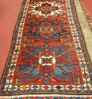 Lot 1455 - A Caucasian woollen hall runner, the red...