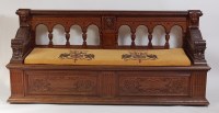 Lot 1462 - A late 19th century continental oak settle,...