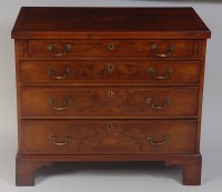 Lot 1463 - A walnut bachelors chest, in the George II...