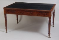 Lot 1469 - An early 19th century mahogany library table,...