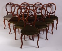 Lot 1473 - A set of ten Victorian walnut balloon back...