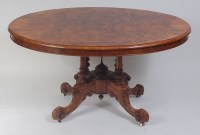 Lot 1479 - A Victorian figured walnut loo table, the oval...