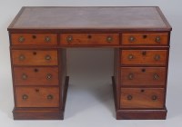 Lot 1487 - A George IV mahogany twin pedestal desk, the...
