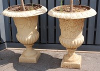 Lot 1502 - A pair of cast iron pedestal campagna urns,...
