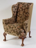 Lot 1504 - An early 20th century walnut framed wing...