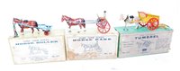 Lot 1207 - Three various boxed Britains horse-drawn farm...