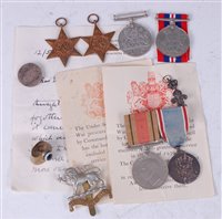 Lot 268 - A group of four WW II medals to include...