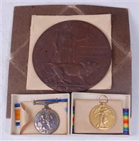 Lot 33 - A WW I Casualty group to include a bronze...