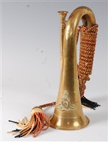 Lot 274 - A brass bugle bearing the crest of the Royal...