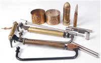Lot 69 - A WW I trench art cigarette lighter in the...