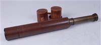 Lot 96 - An early 20th century leather clad brass three...