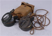 Lot 226 - A green painted military compass marked...
