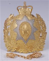 Lot 67 - A Life Guards helmet plate having a brass...
