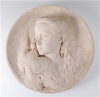 Lot 2403 - A marble wall plaque, of circular form, relief...