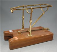 Lot 1406 - A lacquered brass and hardwood wine dispenser