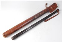 Lot 203 - A lignum vitae truncheon, having a turned...