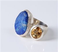 Lot 2631 - A lapis lazuli and citrine ring, the rough cut...