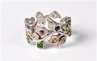 Lot 2566 - A silver and multi gemset floral sprig...