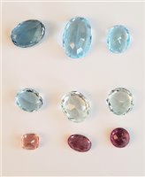 Lot 2681 - A quantity of mixed gemstones, to include blue...