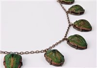 Lot 2213 - A mid-late Victorian 'scarab' beetle necklace,...
