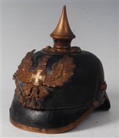 Lot 306 - A WW I Imperial German Prussian pickelhaube,...