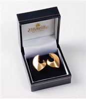 Lot 2185 - A pair of 18ct gold earrings, the polished...