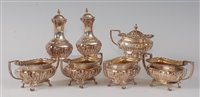 Lot 2163 - An Edwardian silver seven-piece cruet set,...