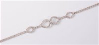 Lot 2273 - An 18ct white gold and diamond bracelet,...
