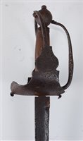 Lot 115 - A 17th century sword, the 70cm single edged...