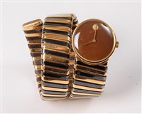 Lot 2345 - A Bulgari Tubogas Serpenti wristwatch, the...