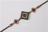 Lot 2241 - An Eastern style multi gemset bracelet, the...