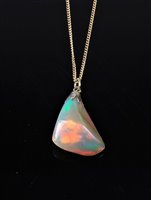 Lot 2220 - An opal pendant, the naturalistic opal pendant,...