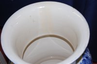 Lot 2093 - A Doulton Burslem floor vase, blue and white...