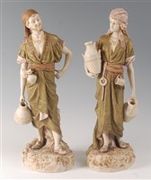 Lot 2095 - A pair of Royal Dux Bohemia figures of...