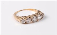 Lot 2191 - An 18ct gold five stone diamond ring, the five...