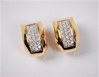 Lot 2224 - A pair of German 18ct diamond earrings, the 12....
