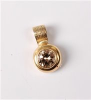 Lot 2264 - A diamond solitaire pendant, the round...