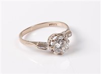 Lot 2295 - An 18ct diamond ring, the principle round...