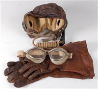 Lot 15 - An R.A.F. Type-C brown leather flying helmet...