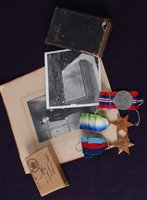 Lot 341 - A group of three WW II medals to include...