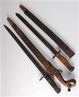 Lot 188 - An American 1913 pattern Remington bayonet,...