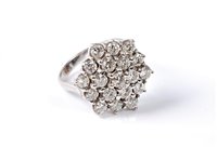 Lot 2230 - An 18ct gold diamond cluster ring, the...